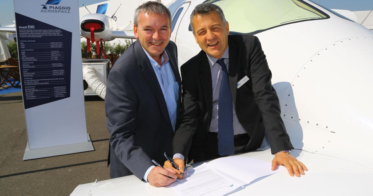 Stuart Mulholland (left), managing director of Zenith Aviation, and Carlo Logli, Piaggio Aerospace CEO.