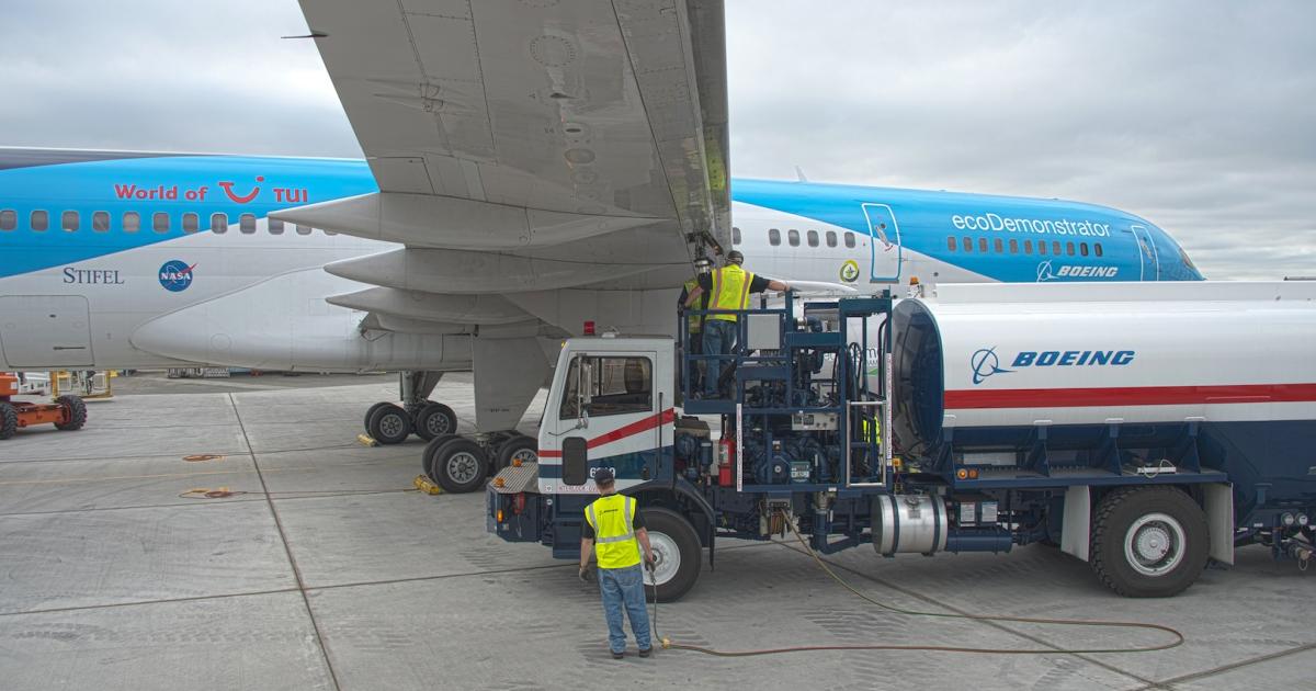 Crews fuel Boeing’s 757 ecoDemonstrator with a blend of 95 percent petroleum jet fuel and 5 percent “green diesel” at Boeing Field in Seattle. The green diesel consists of waste animal fats, inedible corn oil and used cooking oil. (Photo: Boeing)