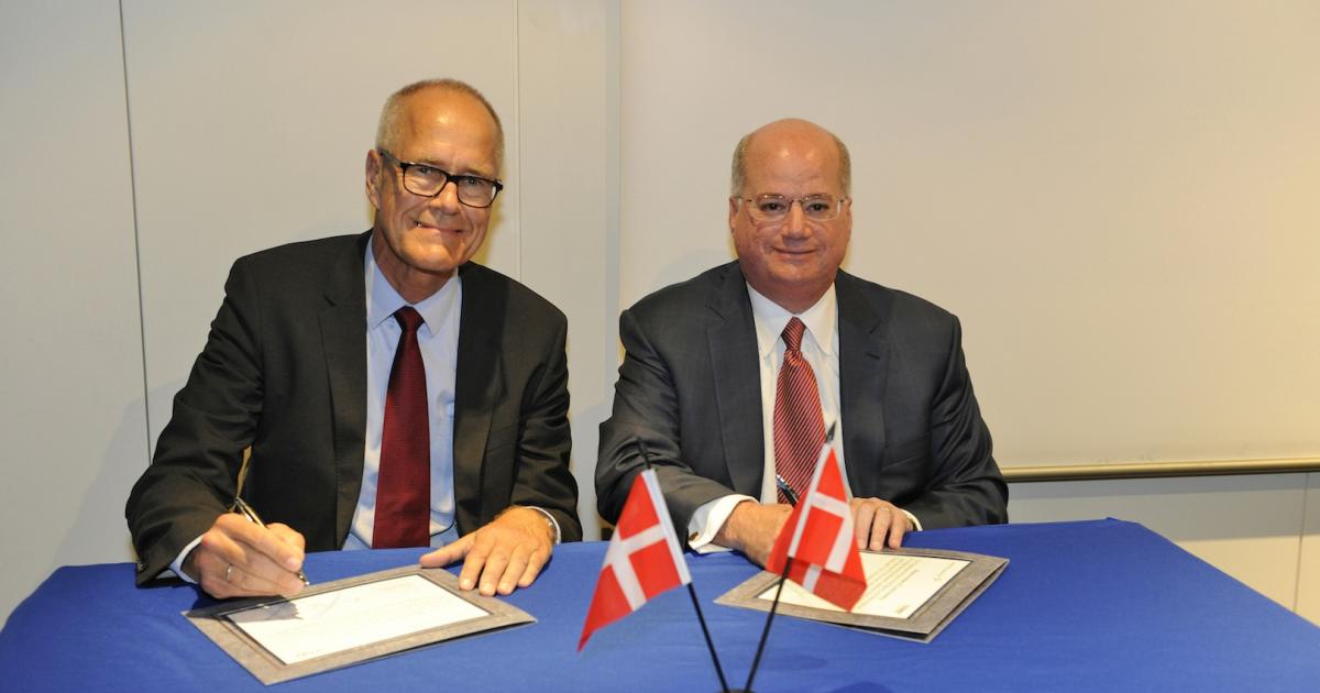 Terma president and CEO Jens Maaloe, l, and Lockheed Martin's Orlando Carvalho sign MoU at Paris Air Show. (Photo: Mark Wagner)