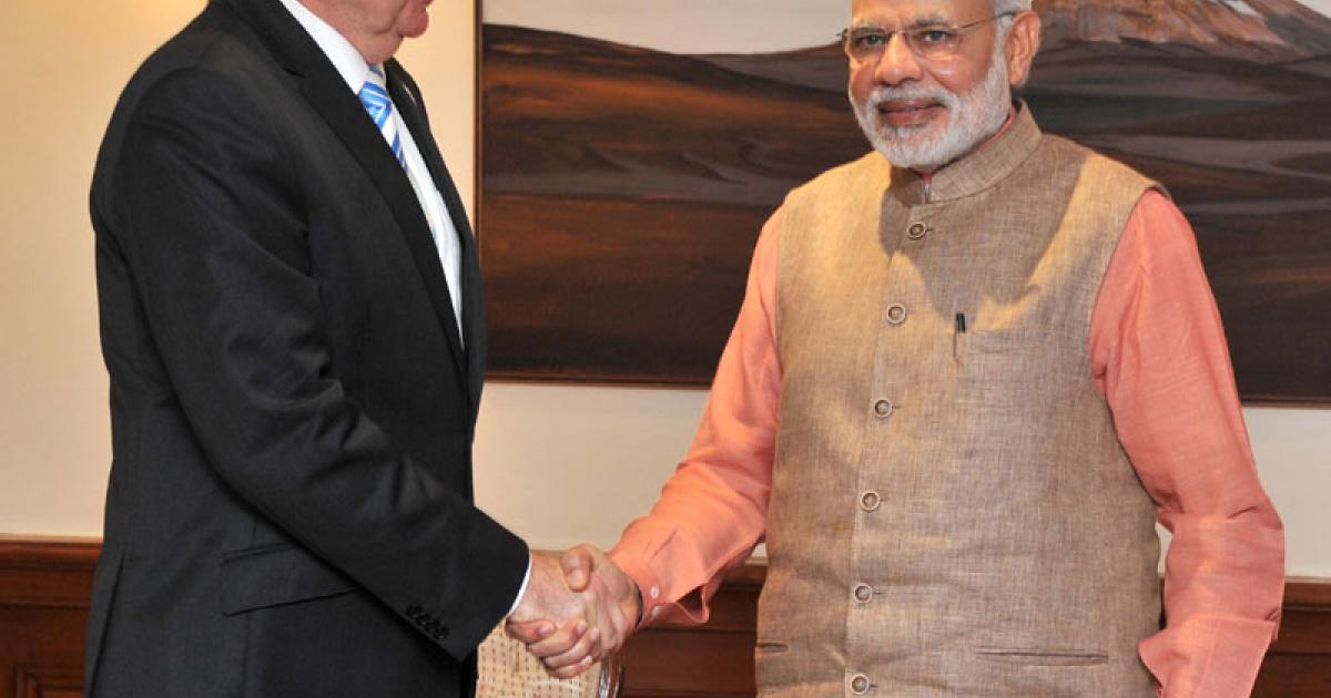 Prime Minister Modi and Israeli Defense Minister Moshe Ya'alon, left, have taken the relationship between his nation and India "out of the closet."