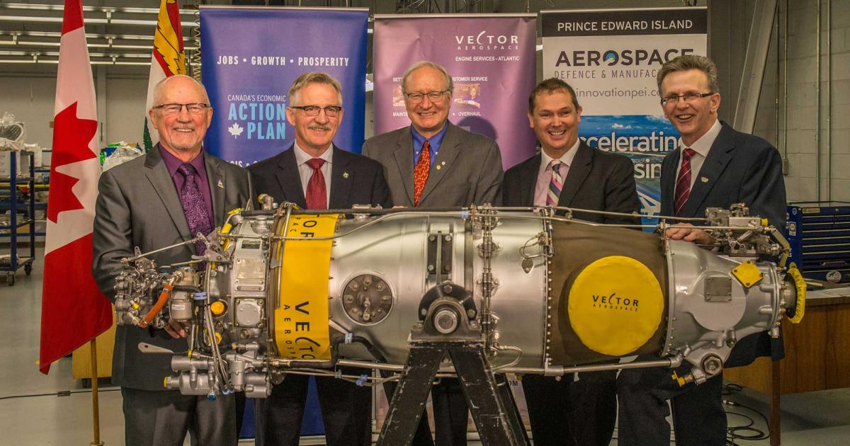 (L to r): Arnold Croken, general manager of Summerside Regional Development; Gerald Keddy, Parliamentary Secretary to the Minister of Agriculture, to the Minister of National Revenue and for the Atlantic Canada Opportunities Agency; The Hon. Wade MacLauchlan, Premier of Prince Edward Island; Jeff Poirier, president of Vector Aerospace Engine Services - Atlantic; and Shawn McCarvill, president of Slemon Park Corp.