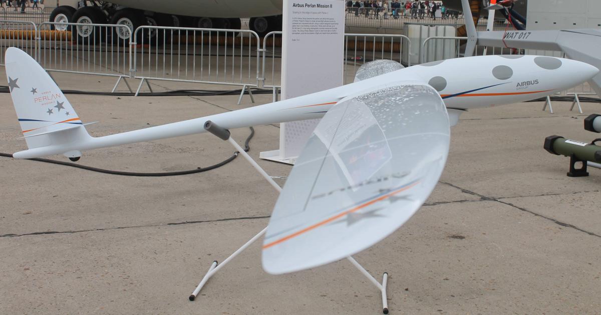 The two-seat Perlan 2 glider, shown here in a scale model displayed at the 2015 Paris Air Show, is making its debut this week at EAA AirVenture 2015 in Oshkosh, Wis. Sponsored by Airbus Group, the aircraft will soar up to 90,000 feet by riding stratospheric mountain waves that occur only in winter and in subpolar regions, in conjunction with the polar jetstream. (Photo: Chris Pocock)