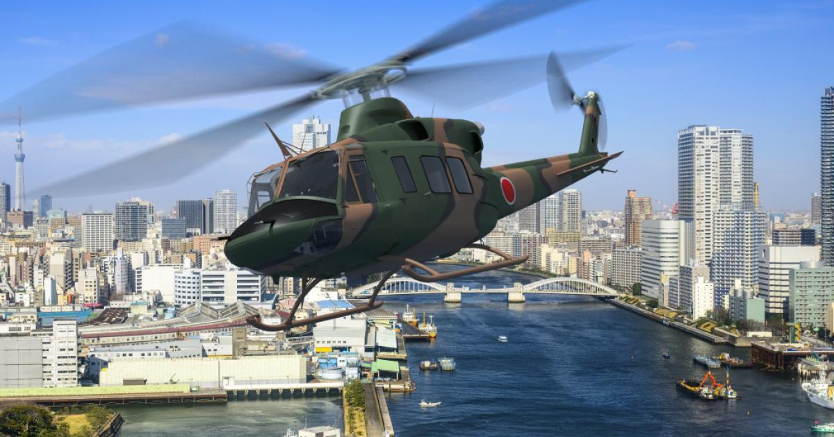 An artist's impression of a Bell 412EPI in Japanese military markings, flying over Tokyo. (Image: Bell)