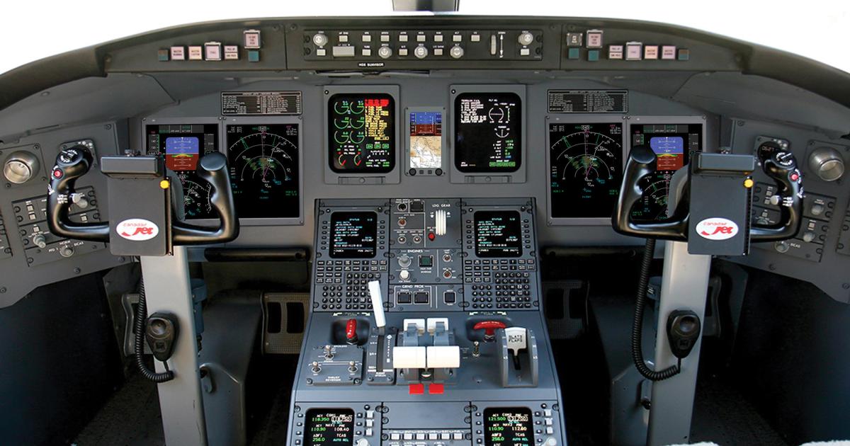 This CRJ900 is equipped with an IS&S NextGen-compatible cockpit avionics suite.