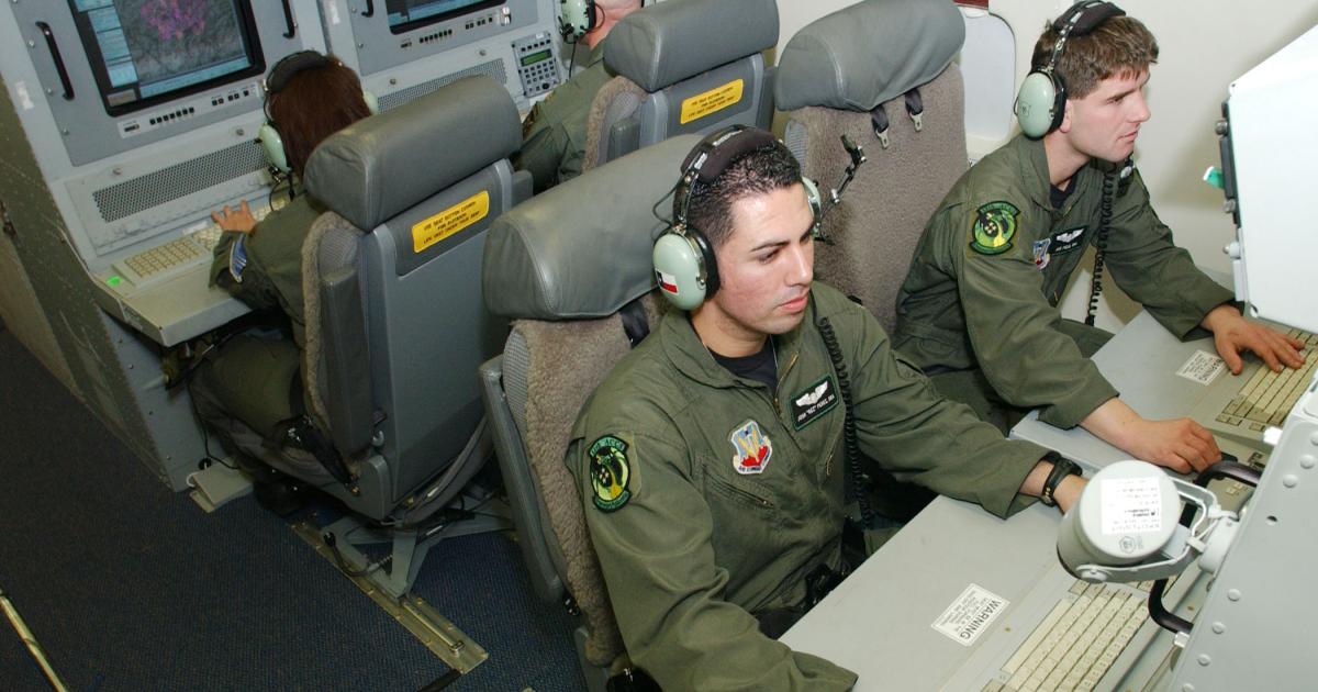 A U.S. Air Force crew works aboard an E-8C airborne command and control and surveillance aircraft. (Courtesy: Northrop Grumman)