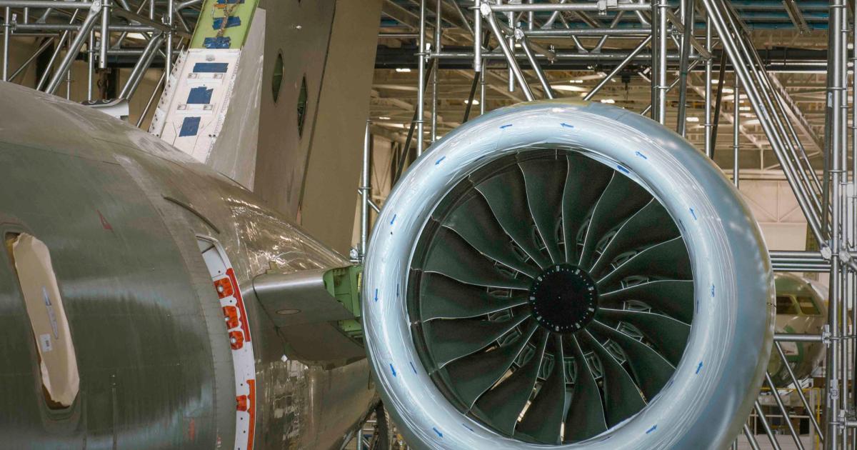 The first Bombardier Global 7000 flight-test vehicle (FTV1), which is taking shape at the company’s plant in Toronto, Ontario, was fitted with pair of GE Passport engines last week. FTV1 is structurally complete and sitting on its own gear, and thus is expected to be rolled out by year-end. The Global 7000 is slated to be certified in 2018, with its even longer-legged Global 8000 sibling to follow by a year. (Photo: Bombardier Business Aircraft)