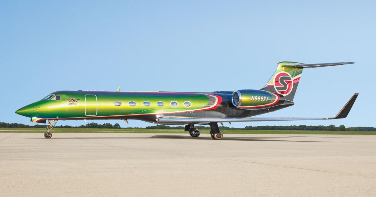 The stripes and hexagonal patterns on the Sexyjet GV appear to change color, an effect of the ChromaLusion paint, itself an unusual feature on aircraft.