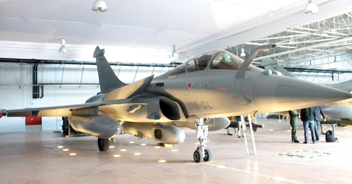 A French air force Rafale carrying the AREOS reconnaissance pod on a centerline station. 
