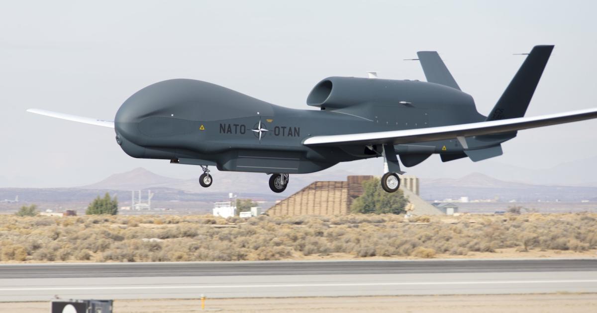 The first Global Hawk built for NATO's AGS program touches down on December 19 at Edwards Air Force base. (Photo: U.S. Air Force)