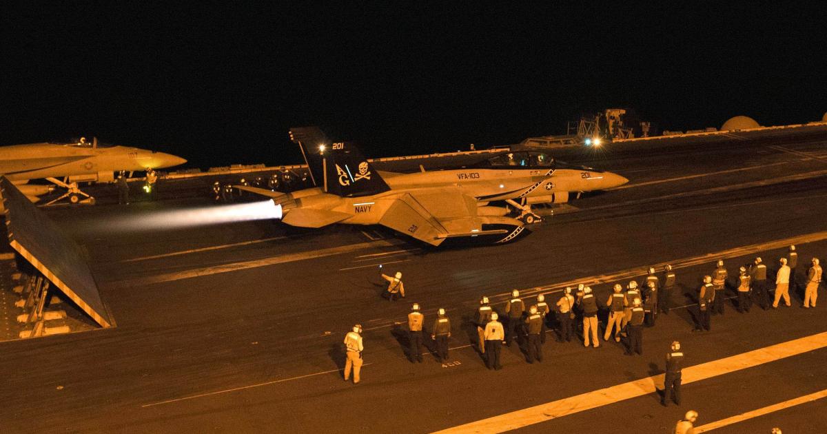 After a short gap, US Navy carrier operations in support of OIR have resumed. This F/A-18F Super Hornet launched from the deck of the USS Harry S. Truman in the Arabian Sea on December 28. (US Navy)
