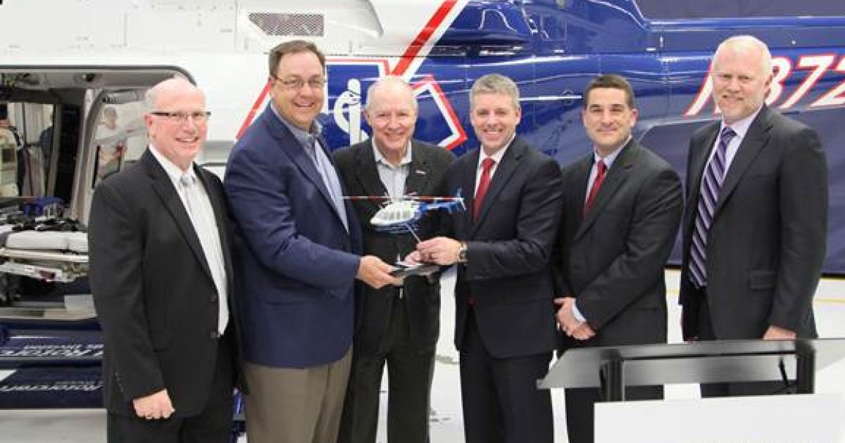Air ambulance operator Air Methods accepted the first EMS-configured Bell 407GXP this week during a ceremony at its Englewood, Colo. headquarters. (Photo: Bell Helicopter)