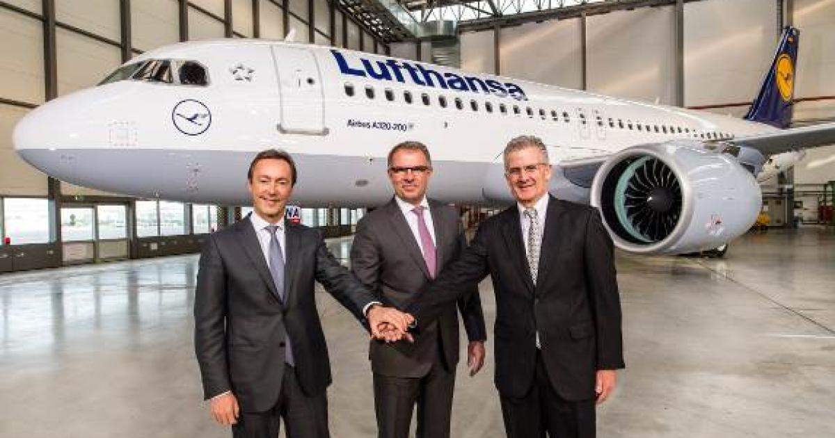 Airbus president and CEO Fabrice Bregier (left) joins Deutsche Lufthansa chairman and CEO Carsten Spohr (center) and Pratt & Whitney president Robert Leduc to celebrate the first delivery of the A320neo. (Photo: Airbus)