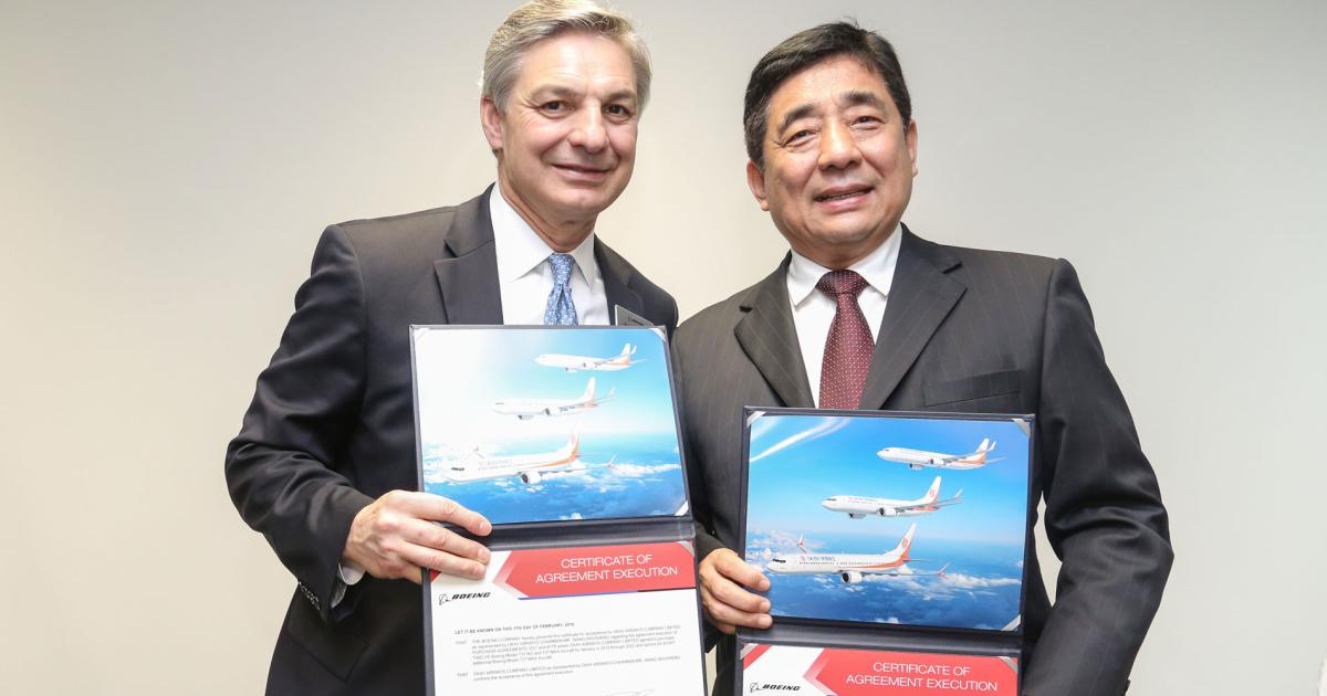 Ray Conner, president and chief executive officer of Boeing Commercial Airplanes and Wang Shusheng, chairman of Okay Airways signed a $1.3 billion deal yesterday.
