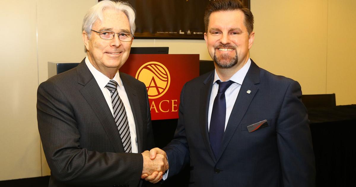 Hongkong Jet CEO Denzil White (left) and Asia Jet CEO Mike Walsh announced a deal on April 11 at ABACE 2016 for the former to acquire the latter company. The proposed agreement has Hongkong Jet purchasing Asia Jet and its subsidiary Asia Jet Partners (Shanghai), as well as its joint venture Asia Jet Partners (Malaysia). The joint venture partner is Berjaya Vacation Club, which is a subsidiary of Berjaya Corp. They expect the transaction to close in the second quarter of 2016. (Photo: David McIntosh/AIN)