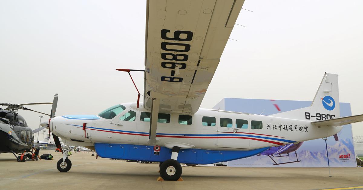 Chinese sales of utilitarian aircraft like this Textron Aviation Cessna Model 208B Grand Caravan–shown here with an optional belly-mounted cargo pod–are growing faster than business jets. (Photo: David McIntosh/AIN)