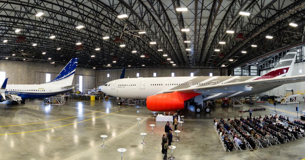 A widebody ACJ330 and three narrowbody bizliners—two BBJs and a Sukhoi Business Jet—were on display during the April 27 ceremony to celebrate expansion of Comlux America's hangar to 157,000 sq ft. The ACJ330 is Comlux America’s first widebody completion project and its 12th VIP completion. (Photo: Comlux America)