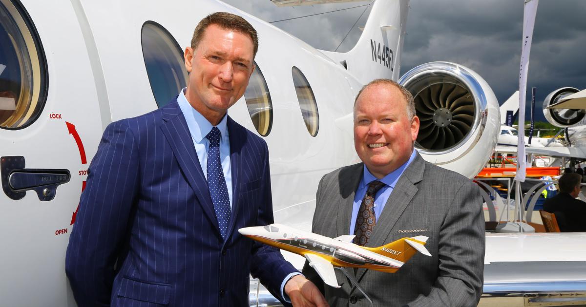 Flexjet International managing director Raymond Jones (l) and Nextant executive vice president Jay Heublein inked a deal yesterday at EBACE for the former company to update eight of Flexjet’s 400XTs to the XTi standard, as well as meet European avionics mandates.