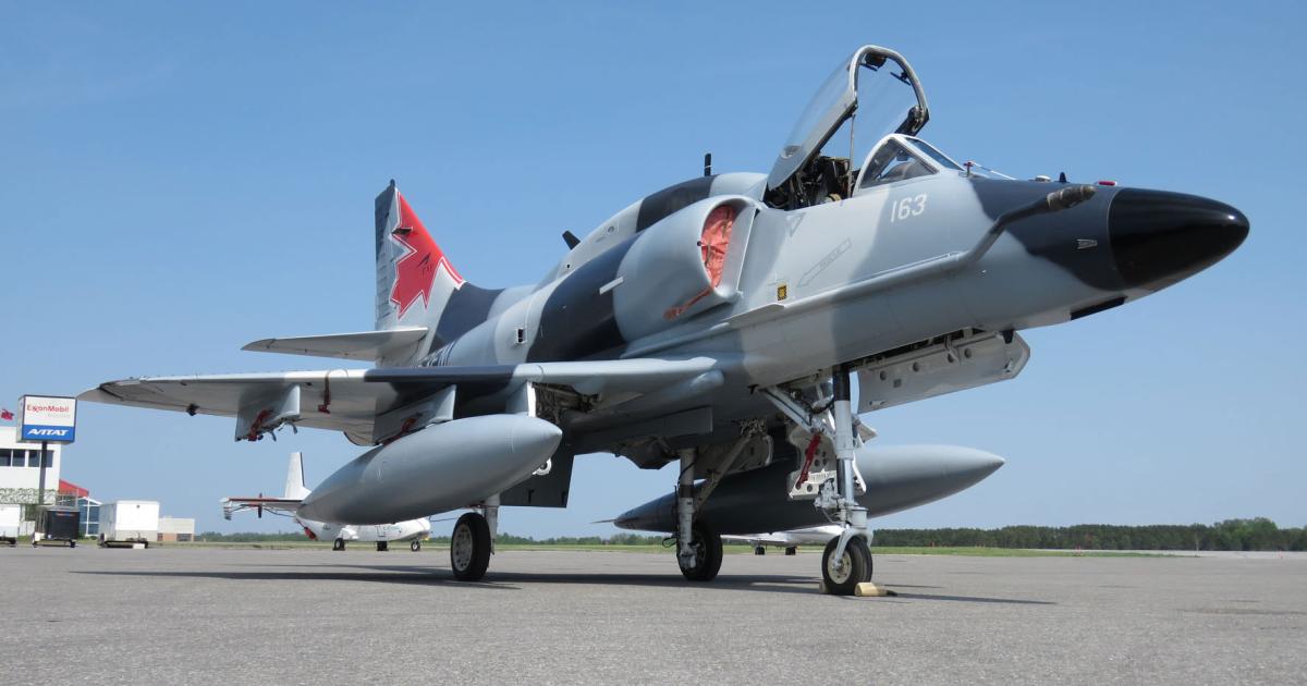 The CAE/Draken bid for the CATS contract was promoted at a defense show in Ottawa last week. A suitably painted A-4N Skyhawk was presented to invitees at the adjacent international airport. (Photo: David Donald)