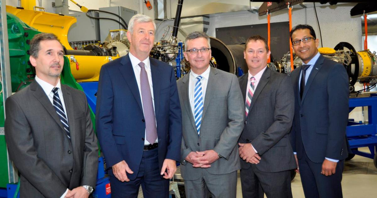 Inside the new Vector Aerospace test cell (L-R): Steve Tully, director supply management, contracts and real estate, Jazz Aviation LP; Declan O’Shea, president and CEO of Vector Aerospace; The Honourable J. Heath MacDonald, Minister of Economic Development and Tourism, PEI Government; Jeff Poirier, president of Vector’s Engine Services, Atlantic division; and Satheeshkumar Kumarasingam, senior v-p commercial services, Pratt & Whitney Canada.