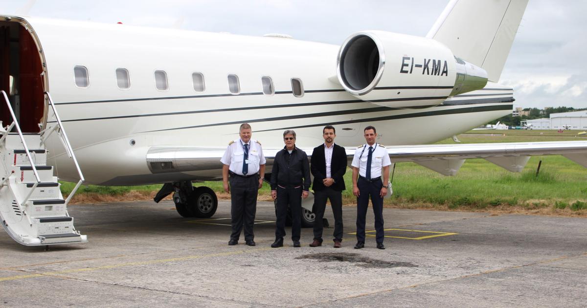 L-r: Etienne Bornand; GainJet Ireland CEO Dimitrios Kehayas; Rick Shaban, GainJet Ireland's ground operations manager; and Dimitrios Kontoulis stand beside GainJet Ireland’s first aircraft, a Challenger 604 registered EI-KMA.