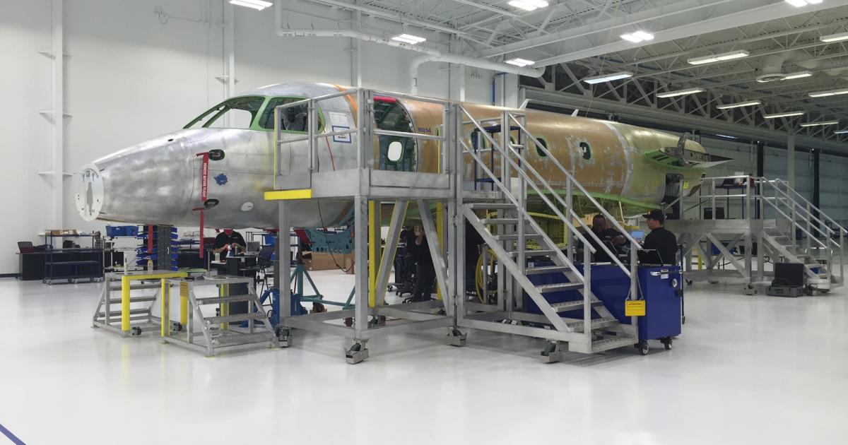 The first Embraer Legacy to be assembled in the U.S.—a Model 450—started rolling down the production line at the company's newly expanded Melbourne, Florida facility on May 16. It held a ribbon-cutting ceremony to officially open the enlarged facility on June 2, with company officials, elected officials and hundreds of guests attending. (Photo: Chad Trautvetter/AIN)