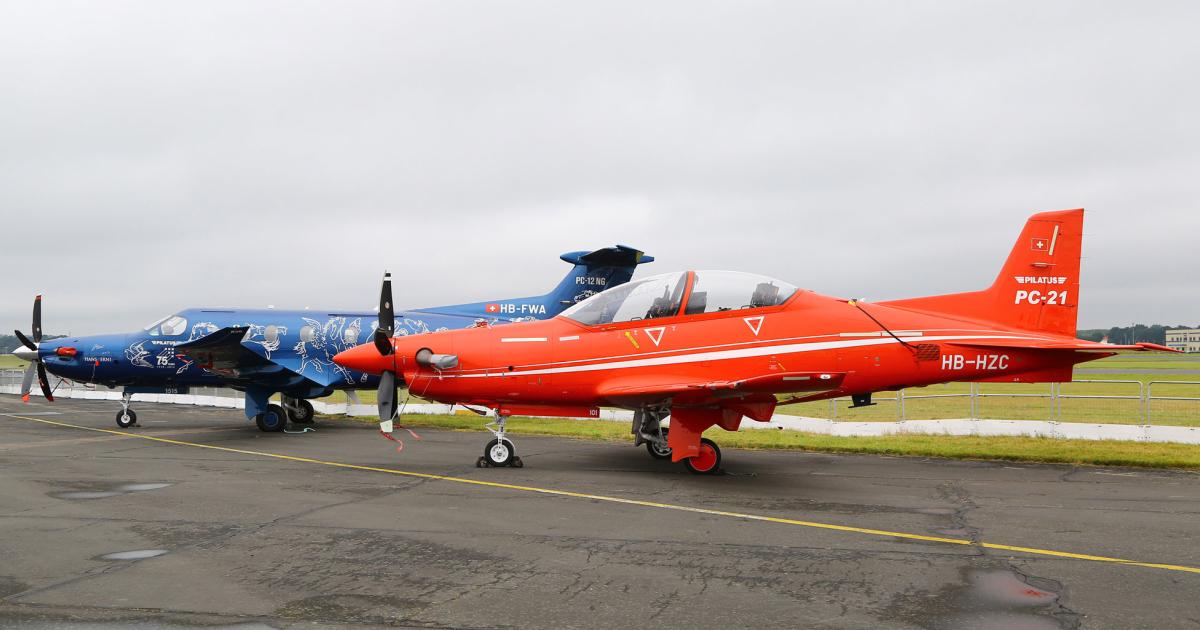 Pilatus’ presence at Farnborough 2016 includes the PC-12 (rear) and the PC-21 advanced military trainer.
