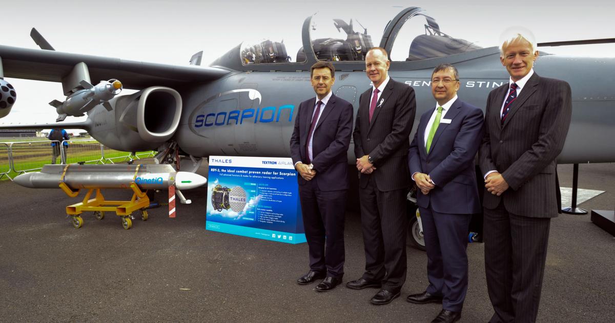 Left to right: Steve Wadey, CEO QinetiQ; Scott Donnelly, chairman and CEO, Textron; Victor Chavez, CEO Thales UK; and Sir Steven Dalton, senior air advisor to Textron AirLand.