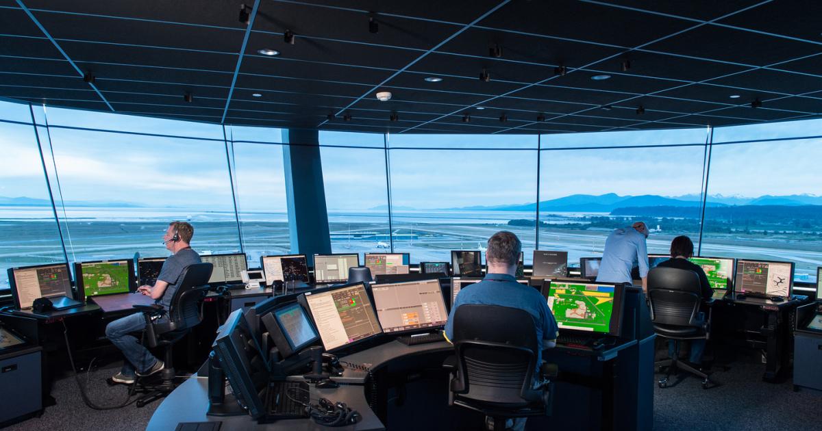 Nav Canada controllers are shown in the control tower at Vancouver International Airport. (Photo: Nav Canada)