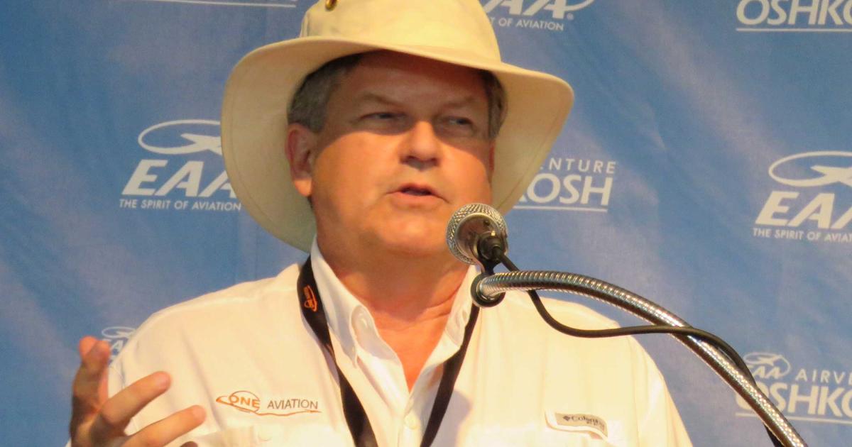 Chairman Alan Klapmeier provides more details on the new larger Eclipse model code-named "Canada" Monday at EAA AirVenture. Klapmeier said the new model would like be ready in two to three years and would replace the model 550. (Photo: Mark Huber)