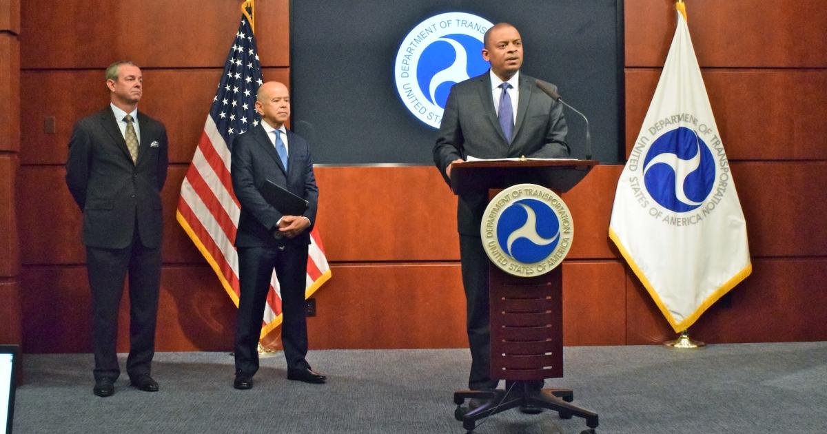 Left to right: AUVSI CEO Brian Wynne, FAA Administrator Michael Huerta and Transportation Secretary Anthony Foxx addressed unmanned aircraft rules at DOT headquarters. (Photo: Bill Carey)