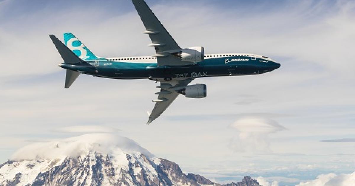 The fourth 737 Max 8 flies past Washington State's Mount Rainier. (Photo: Boeing) 
