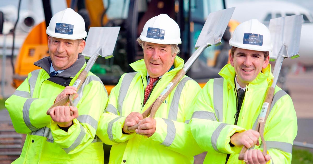 Pulling shiny-shovel duty during the hangar groundbreaking at London Biggin Hill Airport are (left to right): Will Curtis, managing director, Andrew Walters, chairman; and Robert Walters, director. The hangar will accommodate up to six Gulfstream G650s.