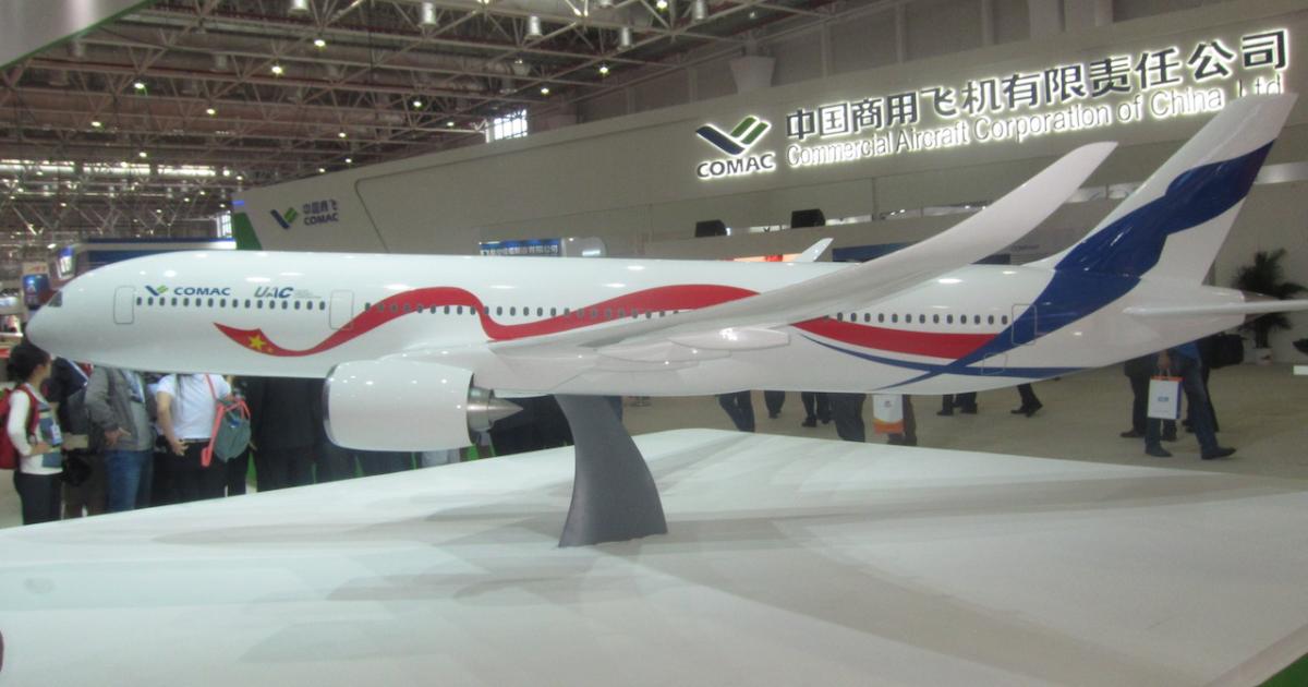 A 10:1 scale model of the proposed C929 widebody sits on display at Air Show China's exhibit hall in Zhuhai. (Photo: Reuben Johnson)