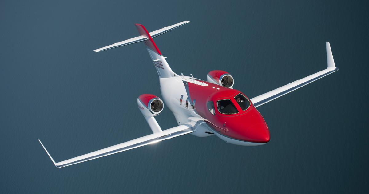 A red and silver HondaJet will be on public display next month during MEBAA 2016, marking the public debut of the light jet in the Middle East. (Photo: Honda Aircraft)