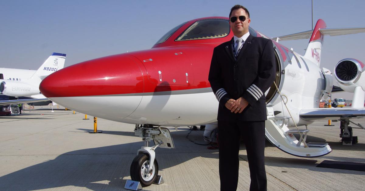 HondaJet Northern Europe sales demonstration pilot Mike Finbow pauses in front of his ride.