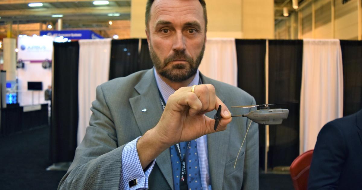 Arne Skjaerpe of Prox Dynamics displays the Black Hornet, which the British military first used in Afghanistan. (Photo: Bill Carey)