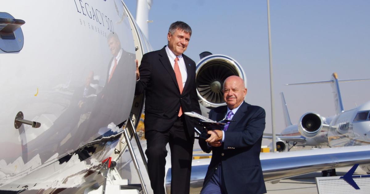 Marco Tulio Pellegrini, president and CEO, Embraer Executive Jets (left), with Fouad Fawaz, chairman and CEO, Cedar Executive. PHOTO: DAVID McINTOSH