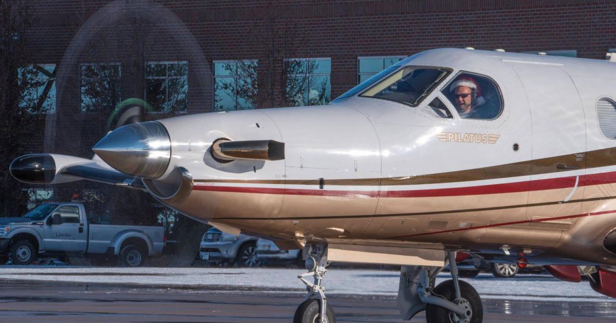 A Pilatus PC-12 was one of several aircraft used in Colorado Business Aviation Association's annual food and toy drive.