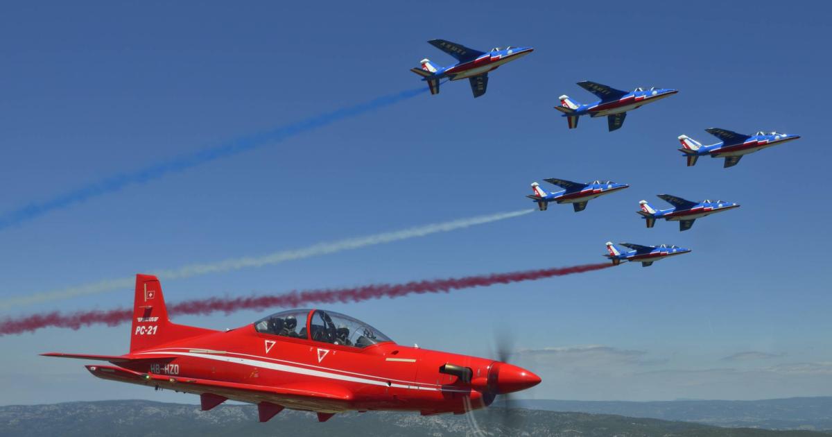 The Pilatus PC-21 may be flying in formation with the Patrouille de France display team more often, now that the Swiss turboprop has been chosen as the new French air force trainer in a service contract won by Babcock. (Pilatus)