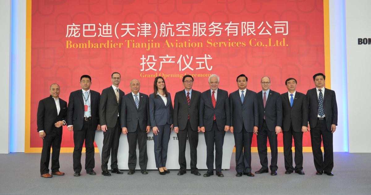 Officials from Bombardier Business Aircraft and Tianjin Airport Economic Area celebrated the opening of a new service center at Tianjin in northeastern China on April 7. [Photo: Bombardier]