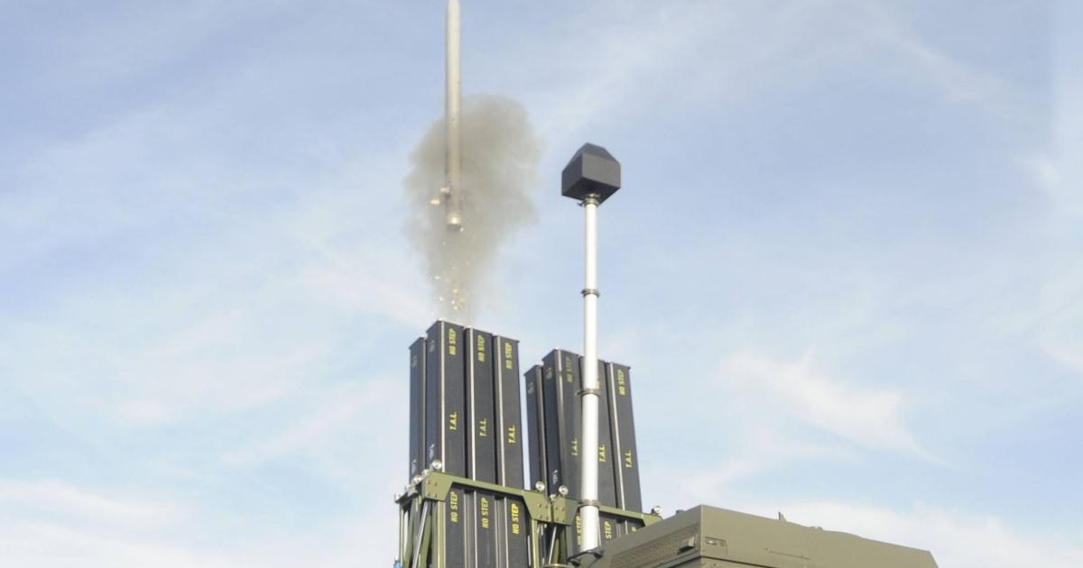 A Common Anti-Air Modular Missile is vertically launched from a wheeled Army vehicle. (MBDA)
