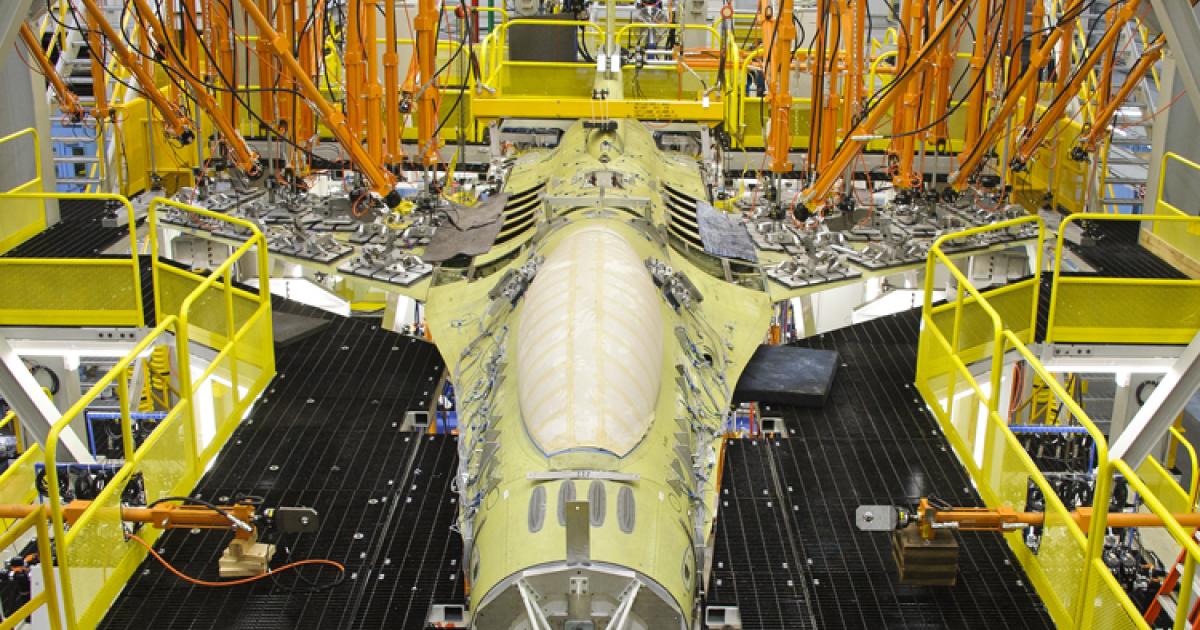 An F-16 undergoes durability testing at Lockheed Martin's full-scale durability test facility in Fort Worth. (Photo: Lockheed Martin)