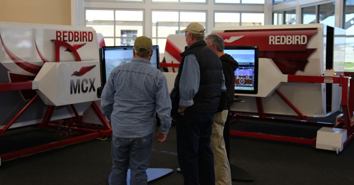Visitors to the FBO often drop by the other side of the facility to check out the company's simulators. (Photo: Redbird)