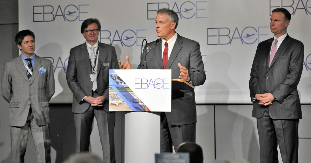 GAMA president Pete Bunce (foreground) addresses attendees during Sunday’s kickoff event at EBACE 2017. He’s accompanied by (L to R) EBAA CEO Brandon Mitchener, Nicolas Chabbert, chairman of EGAMA, and NBAA president and CEO Ed Bolen. 