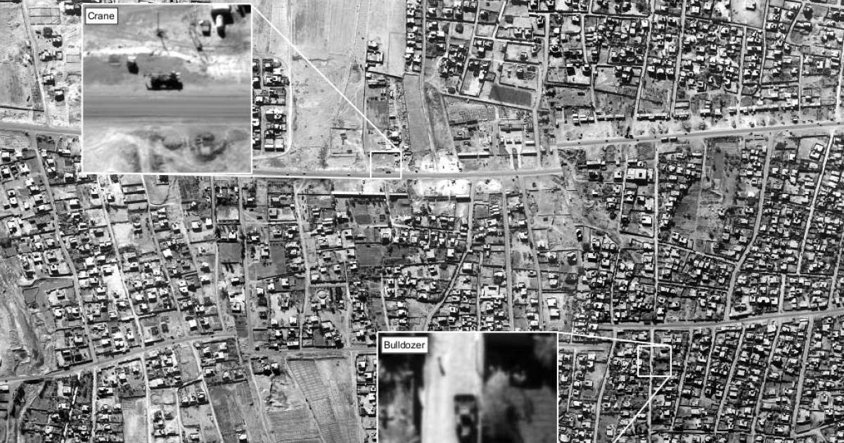 This image of a suburban area in Iraq taken by an RAF Tornado illustrates the prized, high-resolution area coverage that the Raptor/DB-110 sensor can provide. From this overview, an image analyst has identified and enlarged a crane and a bulldozer that might be in use by insurgent forces to create roadblocks. [UK Crown Copyright 2016]