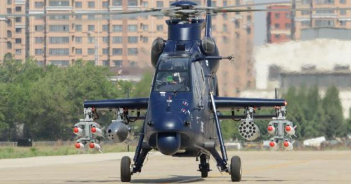 The Z-19E attack helicopter taxiing for its maiden flight, carrying anti-tank missiles, gun pod and rocket pods. (Photo: Chinese Internet)