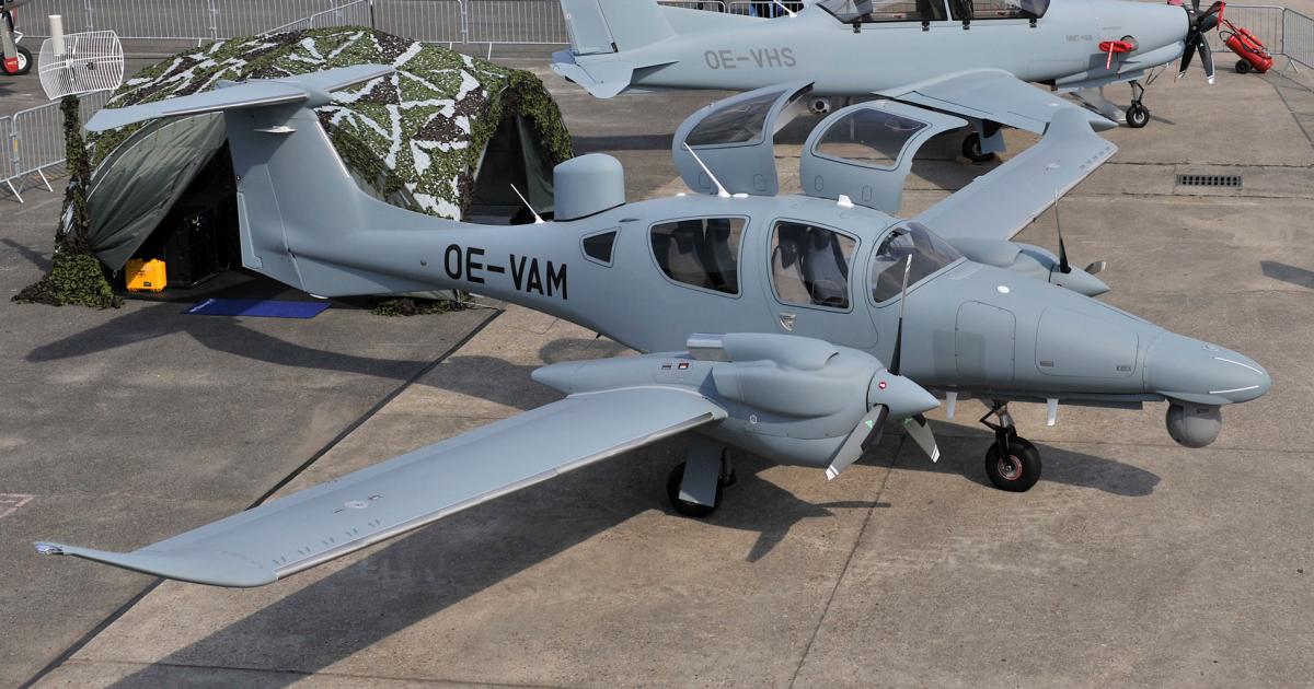 Diamond Aircraft’s static display at Le Bourget includes the diesel-powered DA62 MPP (front) and the DART-450 turboprop reconnaissance trainer.
