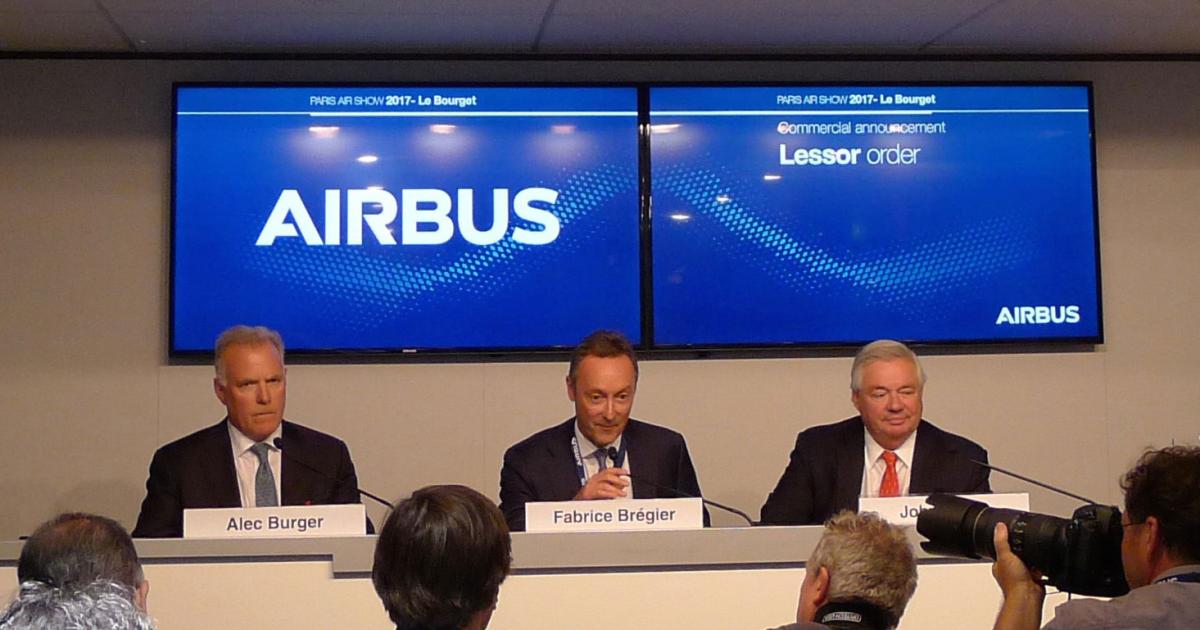 (Left to right) GECAS president and CEO Alec Burger; Airbus president and CEO Fabrice Brégier; and Airbus COO John Leahy outlined details of a large order. 