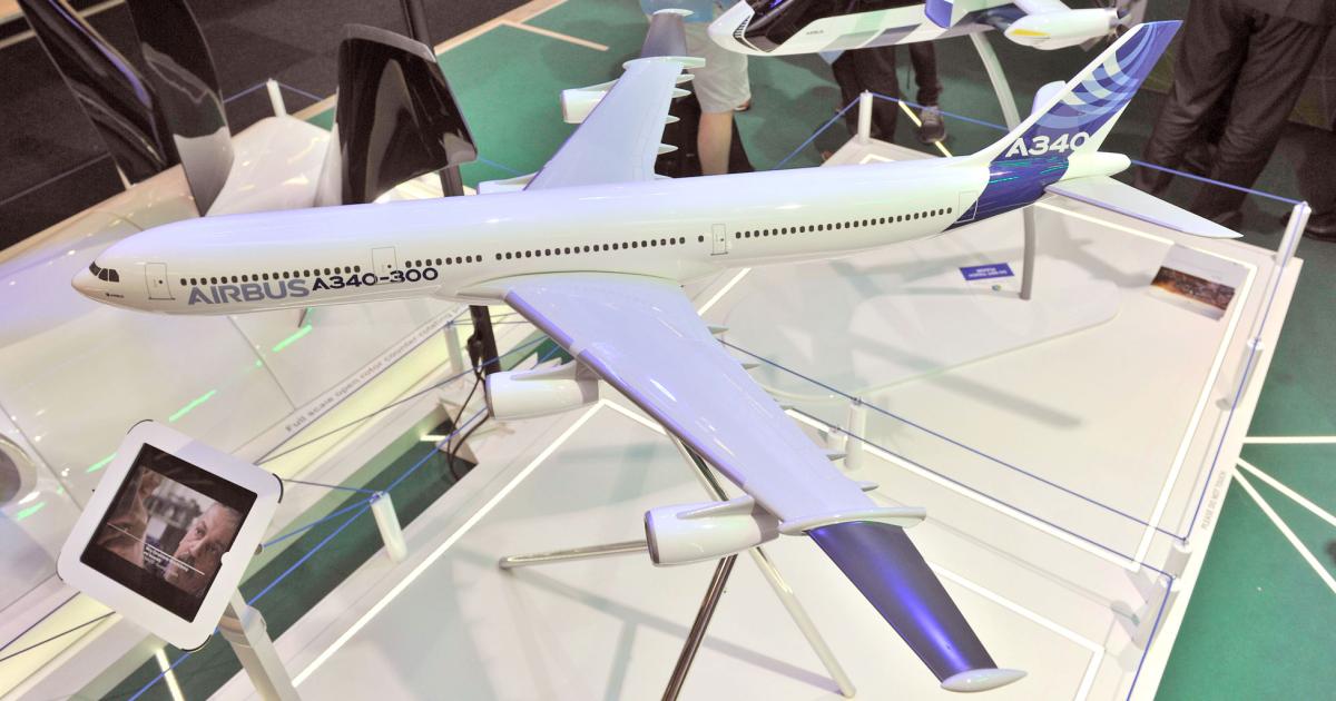Eight-meter-long sections of laminar-flow wing will replace the original outboard panels of an Airbus A340-300, as shown on this scale model being displayed at Clean Sky’s exhibit during the 2017 Salon du Bourget.