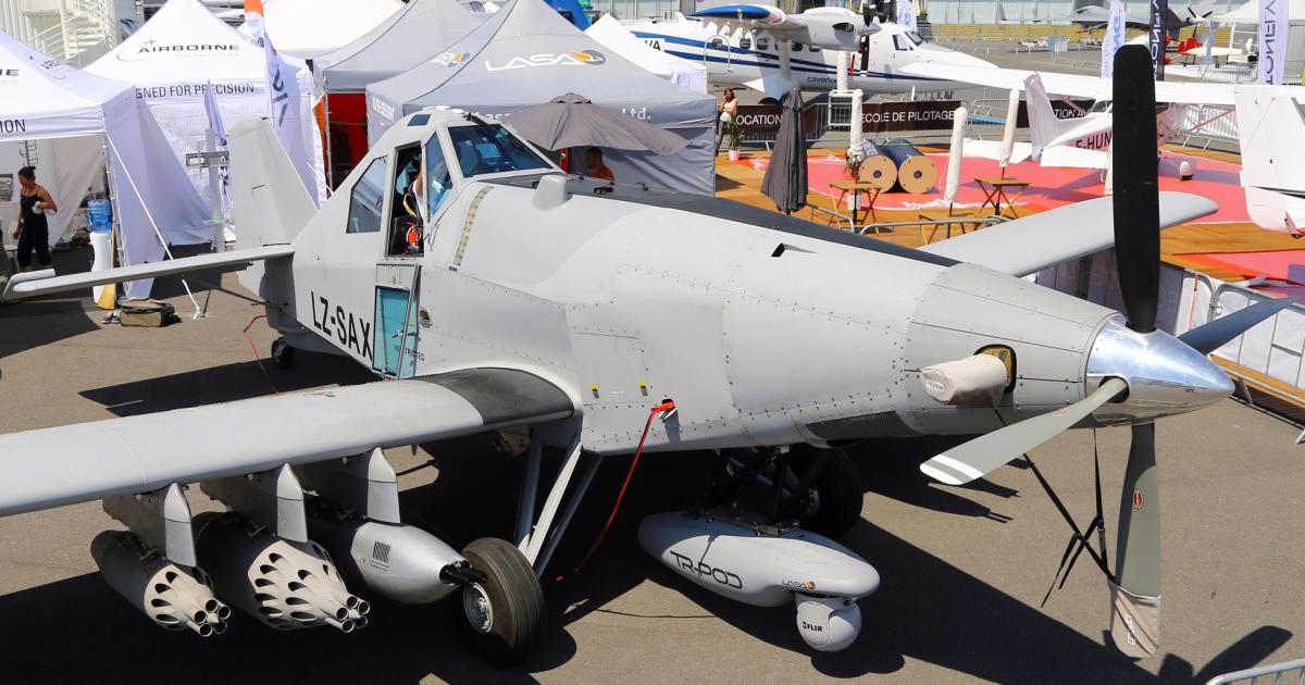 Bulgarian company LASA Engineering is showing a Thrush 510G cropdusting airplane converted for ISR and armed counter-insurgency missions (Static Display A6). LASA says that its product—named the T-Bird—provides “an efficient solution to new asymmetric engagement challenges.” It offers the heaviest payload and the longest endurance in its class, according to the company. L3 is also displaying such a conversion, but one based on the rival Air Tractor agplane (see AIN Paris Airshow News, Tuesday, page 8).  
LASA’s display is situated alongside Airborne Technologies, the Austrian company that has specialized in converting small-to-medium-size aircraft and helicopters for ISR missions. Airborne’s Self Contained Aerial Reconnaissance (SCAR) pod is carried by the T-Bird.